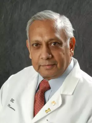 Arnold H. Menezes, MD